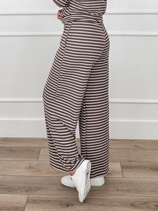 Brown striped high-rise wide-leg pants with ruched waist and side pockets