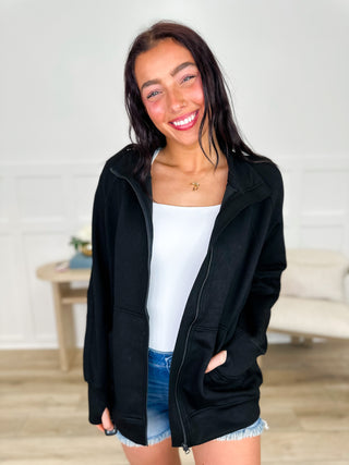 Black zip-up long sleeve sweatshirt with front zipper and hooded neckline