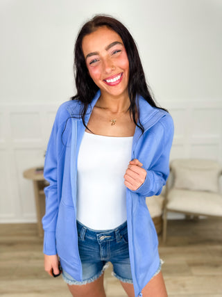 Blue zip-up long sleeve sweatshirt with front zipper and hooded neckline