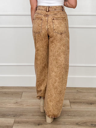 Bibi high-rise brown denim barrel-leg jeans with button-fly front and frayed hem