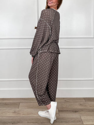 Brown dotted knit lounge set, side view of long-sleeve top and barrel-leg pants