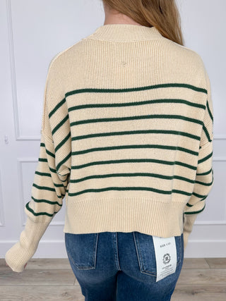 Cream knit cropped sweater top with green striped back and ribbed hem