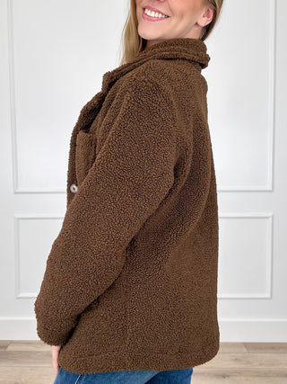 Brown teddy-sherpa jacket with long sleeves, stand collar, and side buttons