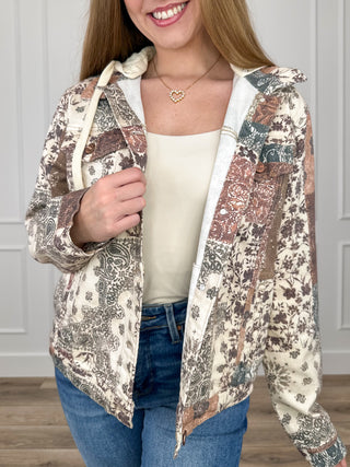 Patchwork hooded denim jacket with long sleeves, cream base and multicolor prints