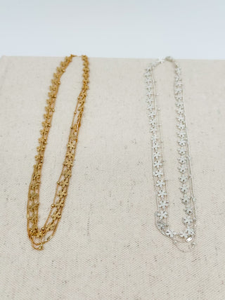 Set of teardrop charm necklaces: gold and silver star-like links