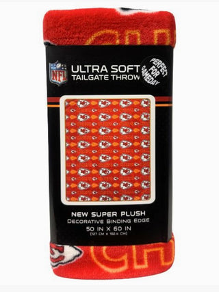 Kansas City Chiefs plush blanket with NFL logo pattern, decorative binding edge