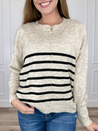Oatmeal long-sleeve knit sweater with black stripe bands and ribbed crew neck