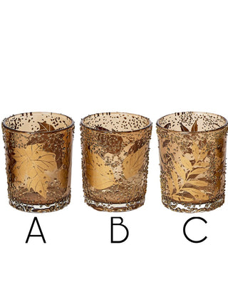 Three amber glass candle holders with speckled gold leaf pattern
