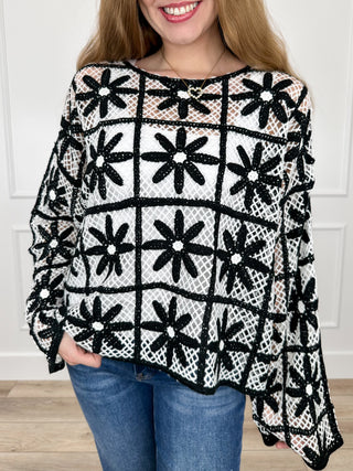 Black and white geometric floral grid long-sleeve knit top, loose fit