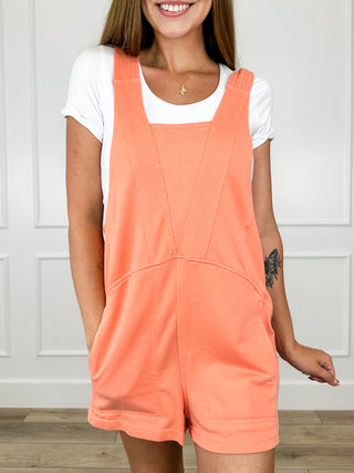 Coral-orange cotton blend romper with square neckline and sleeveless romper shorts