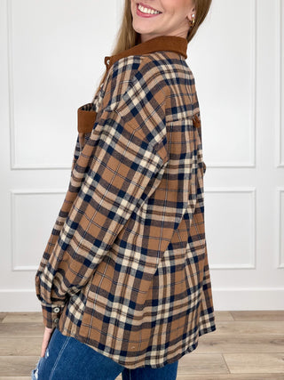 Brown and blue plaid long-sleeve button-up shirt with collar and curved hem