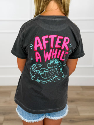Kids grey cotton short-sleeve tee, back 'AFTER A WHILE' gator graphic on darker print
