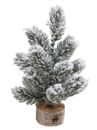 White faux pine tree decor on wooden base, dense snowy needles