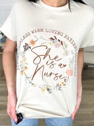 She is a Nurse Cotton Short Sleeve Sand Avery Mae Graphic Tee Shirt (Gildan)