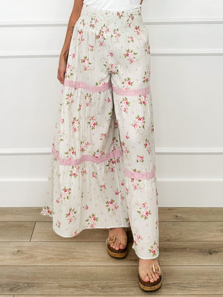 High-rise cotton palazzo pants, cream floral print with pink stripe tiered design