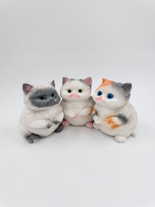 Mega squishy cat trio of gray, white, and light gray plush kittens with big eyes
