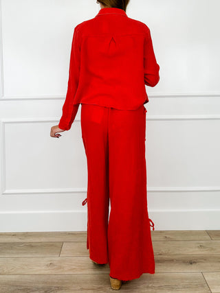 Red two-piece cotton wide-leg set, back view, with cropped jacket and high-rise pants