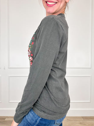 Side view of a dark gray long-sleeve graphic tee with a relaxed fit