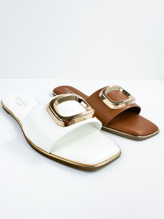 Pair of slide sandals: white and cognac brown, square gold buckle straps