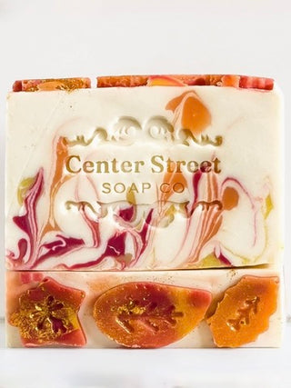 Center Street soap bar: white base with orange and red swirls, embossed logo