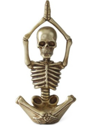Gold resin skeleton decor variants with skull head and ribcage.