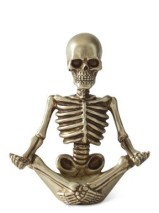 Gold resin skeleton decor variants with skull head and ribcage.
