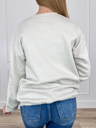 Oat crewneck sweatshirt, back view with long sleeves and ribbed hem