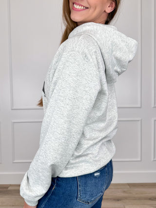 Grey long-sleeve hoodie with drawstring hood and kangaroo pocket, side view