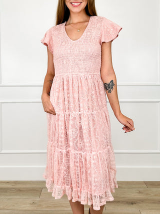 Pink lace short-sleeve dress with V-neck and tiered ruffle hem