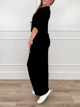 Black ribbed high-rise lounge set side view: short-sleeve top and drawstring joggers