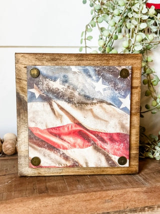 Old Glory wood block sign with printed stars-and-stripes flag on a wooden board