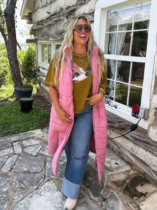 Pink hooded puffer vest, sleeveless quilted style with front pockets