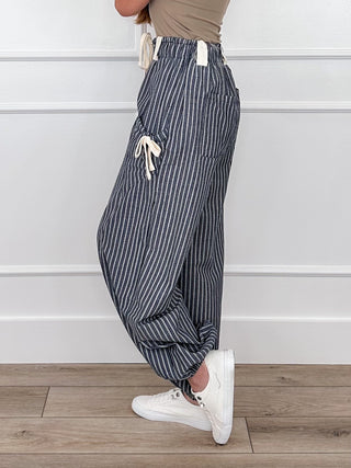 High-rise knit striped pants with drawstring elastic waist, navy pinstripe and side ties