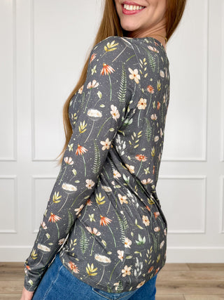 Women's long-sleeve V-neck top with floral leaf print on dark grey