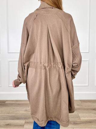 Brown cotton-blend long-sleeve cardigan, back view with gathered yoke and roomy fit