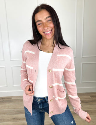 Pink long sleeve button-up cardigan with cream stripe accents and gold buttons
