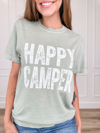 Sage green cotton short-sleeve graphic tee with 'HAPPY CAMPER' text