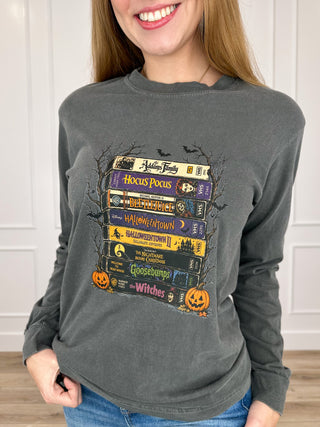 Grey long-sleeve graphic T-shirt with Halloween book stack and pumpkins