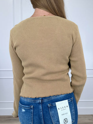 Tan long-sleeve cropped knit top, plain back