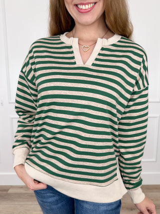 Green and white striped cotton-blend long sleeve top with V-neck and cuffs