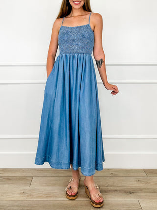 Blue spaghetti-strap maxi dress with smocked bodice and gathered skirt