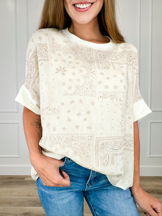 Rayon blend short-sleeve top in light oatmeal with ornate pattern front