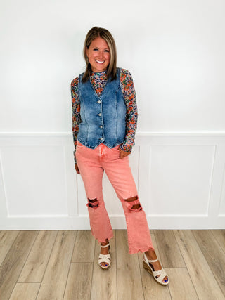 Denim button-front vest, floral long-sleeve top, coral pants, patterned flats