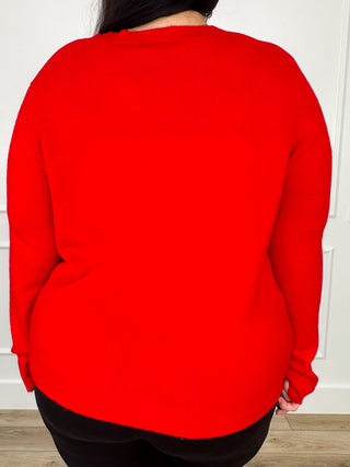 Red knit cardigan, long sleeves, back view