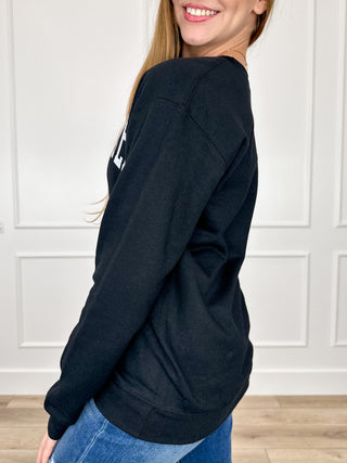 Black crewneck sweatshirt, long sleeves, partial CAFFEINATED graphic on side