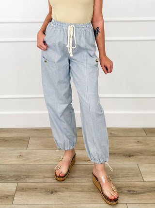 High-rise light blue pinstripe cotton joggers with drawstring and side pockets