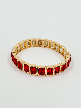 Gold bracelet with red octagon gemstone links