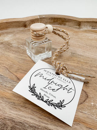 Glass scent diffuser bottle with wooden stopper and rope cord, label: Midnight Ice