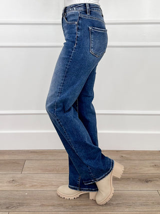 Women's medium wash straight-leg tummy control jeans, side view