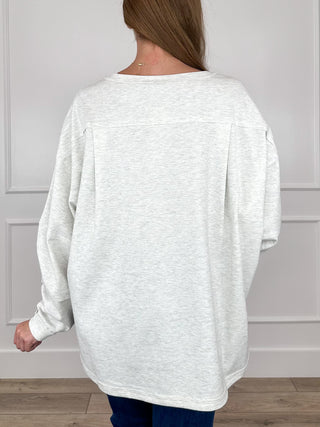 Women's silver heather long-sleeve pullover top, crew neck, back view